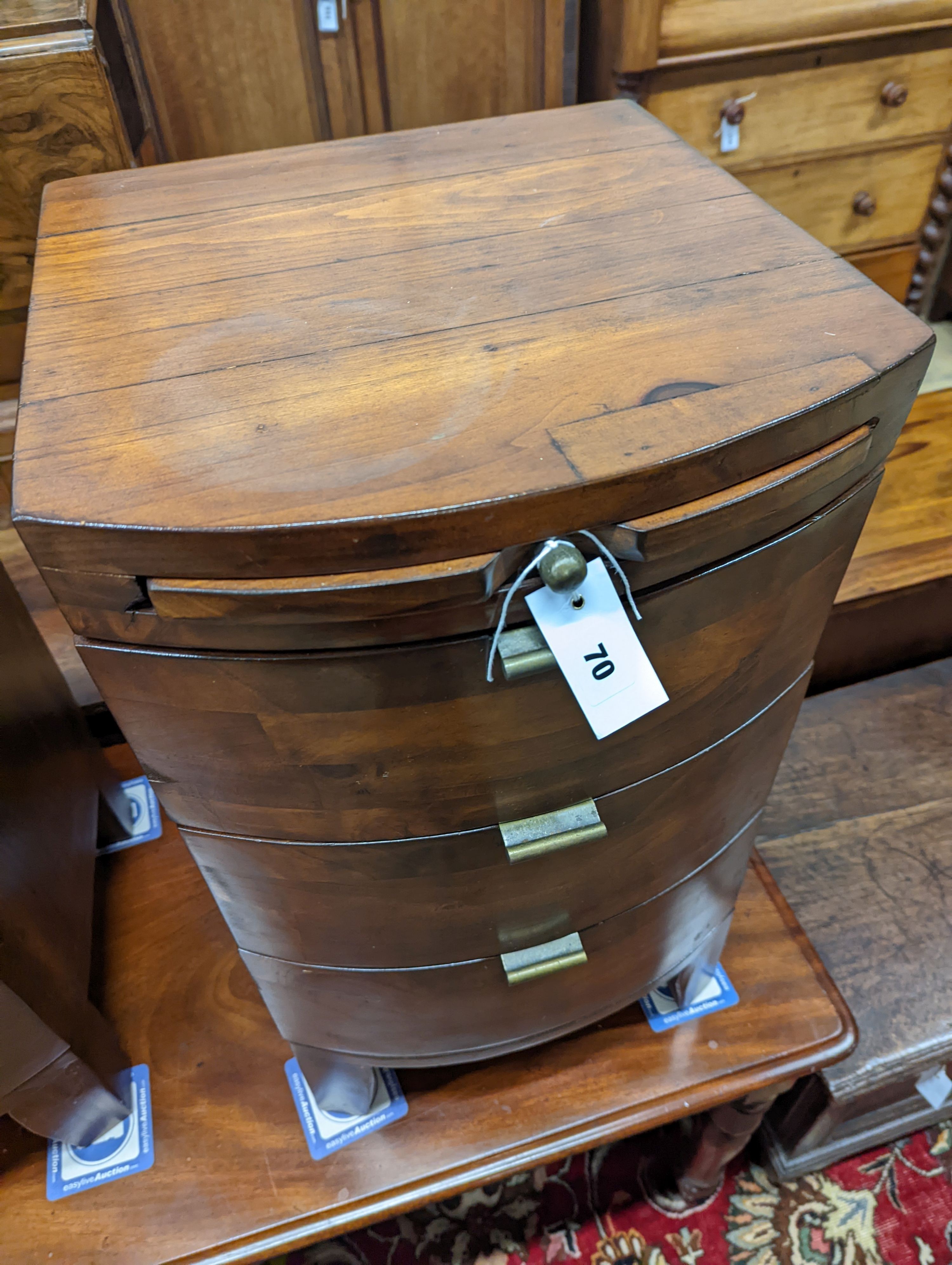 A pair of contemporary bow front three drawer bedside chests fitted slides, width 40cm, depth 40cm, height 71cm